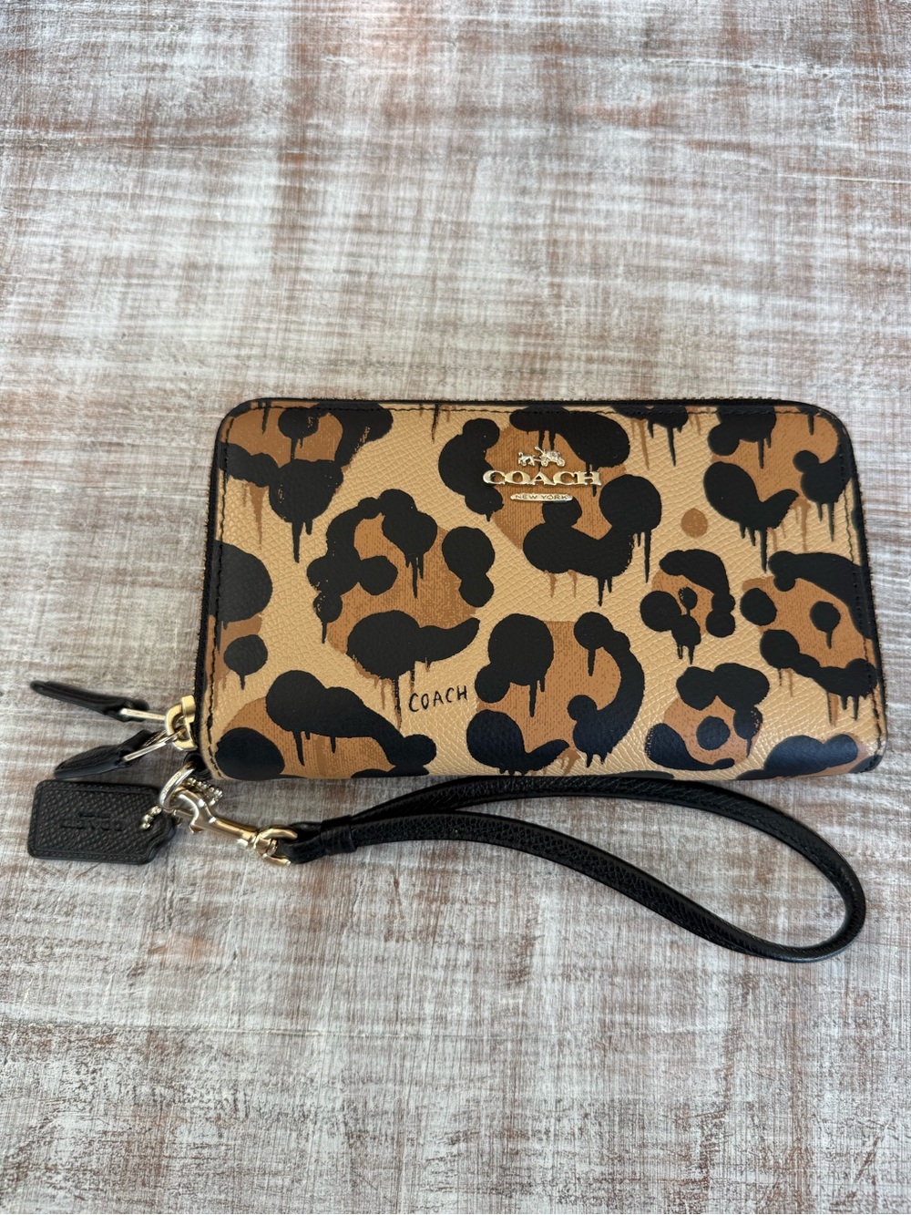 Coach Tan and Black Ocelot Print Zip Wristlet